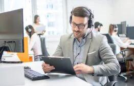About Us 8 stock photo male customer support agent with clipboard working in office 1675369891 transformed e1717482048169.jpeg